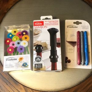 Trudeau set . Wine preserving pump, wine charms, and glass writers. New